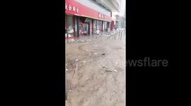 Heavy Rain Cause Floods Roadside Store in Mentougou District, Beijing, China
