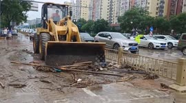 China goes all out to tackle typhoon-induced torrential rain, floods