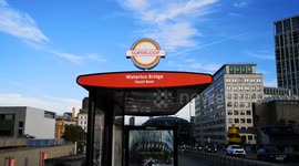A sign for the new TFL Superloop project can be seen on a bus stop on Waterloo Bridge. Only problum is buses cannot get near the bus stop as the Bus Stop is blocked of for a cycle route