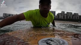 A really Big Surfboard on Tiny Waves makes for perfect Summer Fun!