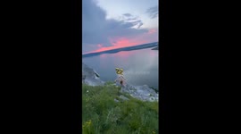 Serene lake birthday circus: a decade of joyful dancing and balloon delight!