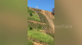 Locals race to top of steep hill at motorcycle event