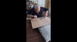 Social worker uses cardboard games to brighten care home residents' days