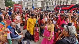 Five hundred women in sarees walk through Westminster on the eve of the National Handloom Day