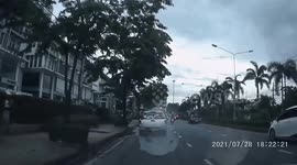Crazed driver involved in car crash waves Samurai sword on road