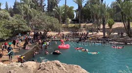 Israelis seek relief in various waters amid heatwaves