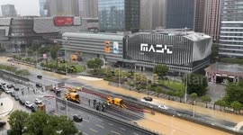 Typhoon Dussuri aftermath: government trucks extracting water from flooded road tunnel in Fuzhou, Southeast China