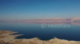 Sinkholes appear on shore of Dead Sea as water level drops