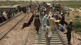 Workers Repair A Railway at The Site of Train Derailed Incident in Nawabshah, Pakistan