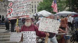 Protestor of Circumcision During the 3rd Federal Indictment of Donald J. Trump