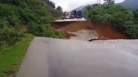 Road collapses during floods in Myanmar