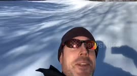 Dog Chases His Human Sledding Down Ski Hill (ID: 103923337)