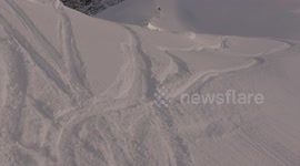 Snowmobile Stunt Ends With a Splash (ID: 206508978)
