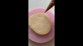 Recipe expert does pitch(er) perfect job of decorating baseball cookie