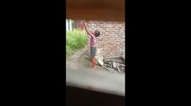 Playful mango bandit: a boy's sticky adventure in Manado, Indonesia