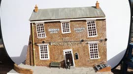 Man rebuilds Crooked House pub brick by brick - as miniature model