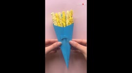 Lebanese woman showcases her blooming artistry with a gorgeous paper flowers bouquet