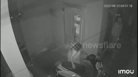 Women spots thief lurking in a dark corner , woman valiantly confronts an armed robber who was ready to attack her with an iron rod