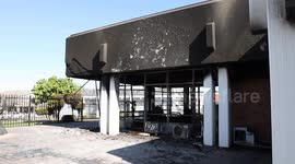 Buildings torched and shops looted in small Western Cape farming town