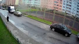 Close call: Voronezh woman narrowly escapes injury as fan falls from balcony