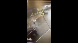 Unforeseen plunge: Bryansk woman survives unexpected water-filled roadway hole