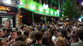 A-Level student revellers drown their sorrows on Broad Street in Birmingham after dip in grades hit thousands across the UK