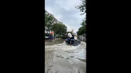 Jet Skiing Through Flooded Streets