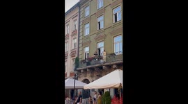 Harmonious sunset serenade: a charming evening of music and love in Lviv's town square