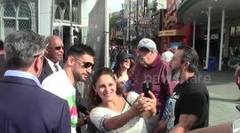 Boxer Amir Khan signs autographs for fans in LA