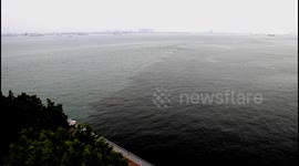 厦门海域发生赤潮海水变褐色