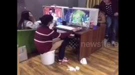 Man uses bucket as toilet so he can keep playing game at internet cafe
