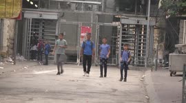 Palestinian students make their way to school in the West Bank city of Hebron
