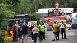 Angry community protest at site of The Crooked House as new demolition crews arrive in Himley, Staffordshire