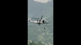 Pakistan cable car rescue - eyewitness footage shows army personnel dangling on chopper to rescue out stranded people