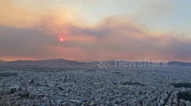 Smoke from a wild fire over athens, Greece on 22/08/2023