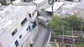 Palestinians inspect the damage of their house after the Israeli forces stormed the town of Qabatiya, near the northern West Bank city of Jenin.