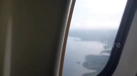 Take off from Guadeloupe to Martinica (French Islands). Airplane window airplane view. 24 aug 2023
