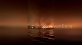 Rare 'firenado' forms during blaze in Canada