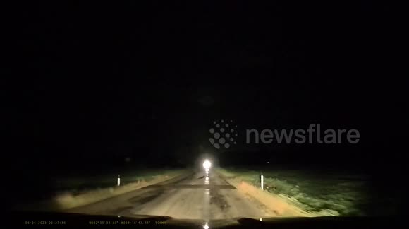 Lightning, downed trees, and heavy rain: Motorist drives through tornado-impacted town in Michigan