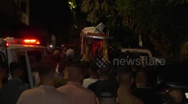 Palestinians carry the body of Ezzelddin Kanaan, 20, who was died after he succumbed to his injuries sustained, during his funeral in the town of Jaba' in the West Bank city of Jenin.