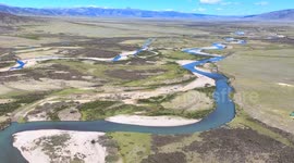 Stockshots: The Winding River in Maoyaba Grassland in Garze, China
