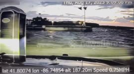 Police chase porta-potty being blown by storm in Michigan