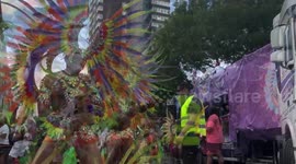 Carnival participants wearing beautiful Samba outfits at Notting Hill Carnival