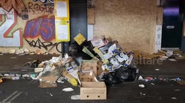 A comical sign on the toilets at the Notting Hill Carnival, also footage shows the very broken urinals