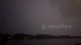 Lighting illuminates sky during storm in Michigan