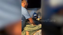 Emotional moment paraplegic man tells his dad he has regained feeling in his leg