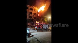 Residential building erupts in flames, killing 6 in eastern China
