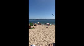 Mini-Tornado Takes Towels and Umbrellas