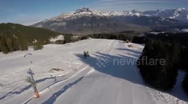 Paraglider Flies into Ski Lift Wire