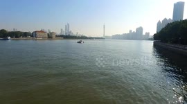 Aerial photography of the water area and surrounding buildings near the Guangzhou Tower.